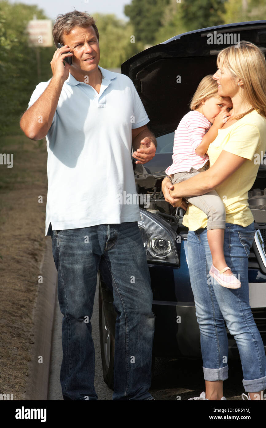 Family Broken Down On Country Road Stock Photo