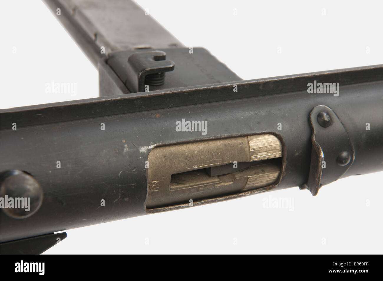 An English submachine gun STEN MK III, calibre 9 x 19, number F 21500 and number 2534 on the trigger guard, stamped 'STEN.MC. MKIII' on the magazine housing, the quite rare bronze bolt with number 2534. Black paint, without its sling. historic, historical, 1930s, 20th century, gun, guns, firearm, fire arm, firearms, fire arms, weapons, arms, weapon, arm, fighting device, object, objects, stills, clipping, clippings, cut out, cut-out, cut-outs, military, militaria, piece of equipment, Stock Photo