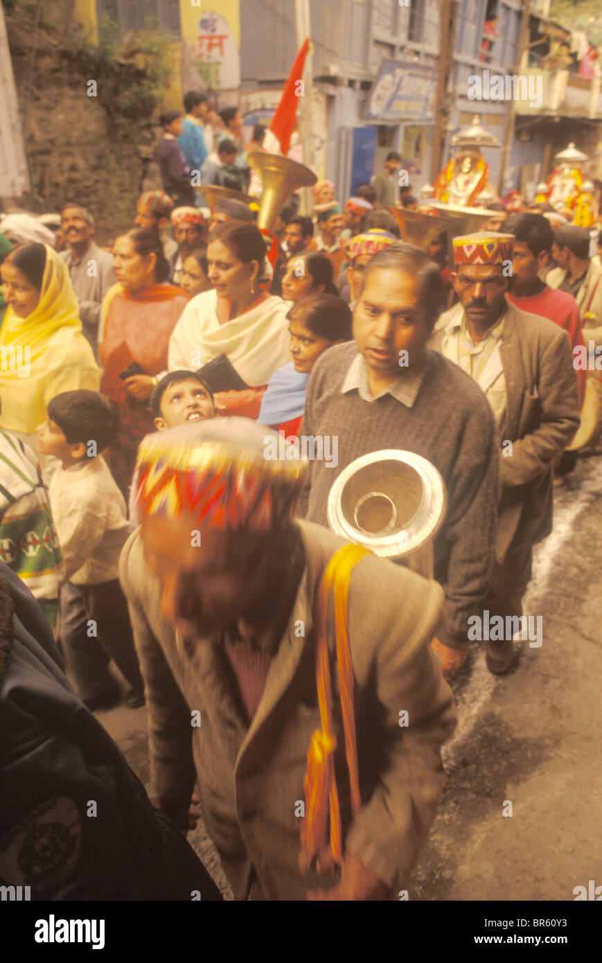 Hindus carry a temple god through the street during the Dussehra Festival. Kulu India. Asia. October 20 1996. Stock Photo
