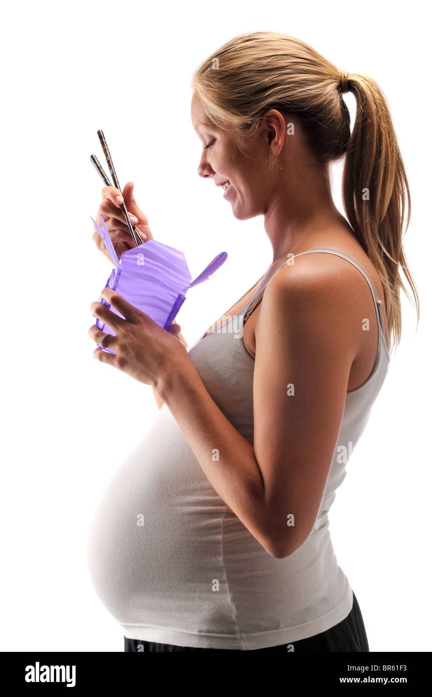 pregnant woman junk food Stock Photo