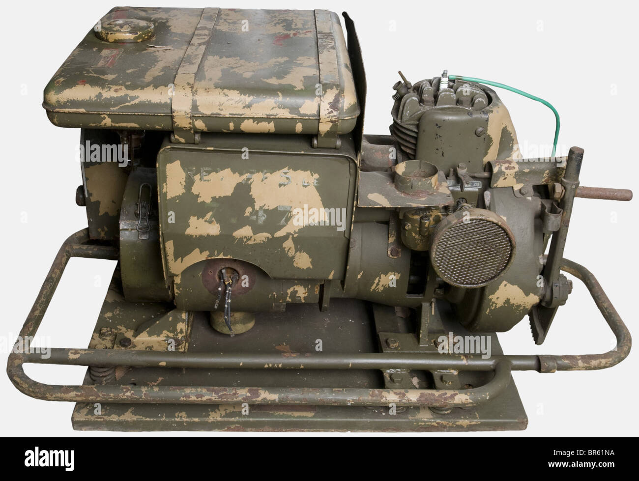 A Wehrmacht generator, big pattern, most probably made by 'Auto Union', two-tone camouflage paint, complete with its accessories (carburettor and tank). historic, historical, 1930s, 1930s, 20th century, technical, technic, material, materials, device, devices, equipment, equipments, utensil, piece of equipment, utensils, technology, militaria, military, object, objects, stills, clipping, clippings, cut out, cut-out, cut-outs, Stock Photo