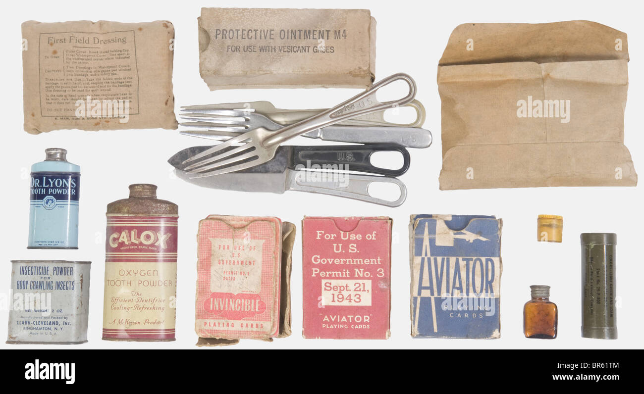 A group of US Army equipment, including various types of forks, a knife with bakelite handle, another one of metal, an issue toilet paper envelope bag, a field dressing pocket, a tube of facial camo, an insecticide box, a toothpaste metallic box, another smaller one. We add three sets of playing cards, one of which offered by the American Red Cross and three empty ammunition boxes (cal. 30 and 45). Eighteen items all together. historic, historical, 20th century, USA, United States of America, American, object, objects, stills, clipping, clippings, cut out, cut-, Stock Photo