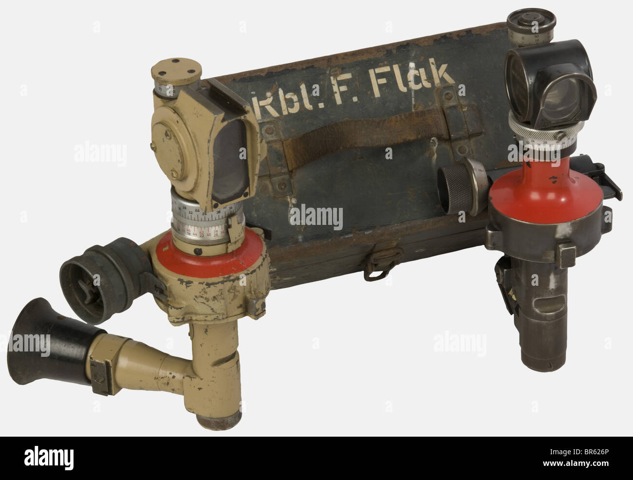 A group of German Army equipment, comprising a yellow 43 painted artillery sight made by 'bmj' pattern 'rblf.36' with serial number 571522, a feldgrau steel case with leather handle and marking 'Rbl.F.Flak' in white paint containing a Flak sight with graduated wooden rings and an aluminium tab inside the cover with instructions and picture of the sight, and a nice sight of blued steel painted red with aluminium graduated ring and hollow stamping 'Rbl.F Flak Navigation Berlin nr.11337 M H/6400'. historic, historical, 1930s, 1930s, 20th century, accessoir, access, Stock Photo