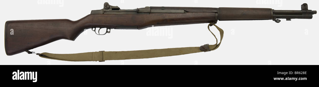An American semi-automatic rifle Garand M1, from an early production of Springfield armory in 1942, calibre 30/06, serial number 911390. With its cloth sling and original bluing. historic, historical, 1930s, 20th century, firearm, fire arm, gun, fire arms, firearms, guns, weapon, arms, weapons, arms, object, objects, stills, clipping, clippings, cut out, cut-out, cut-outs, Stock Photo