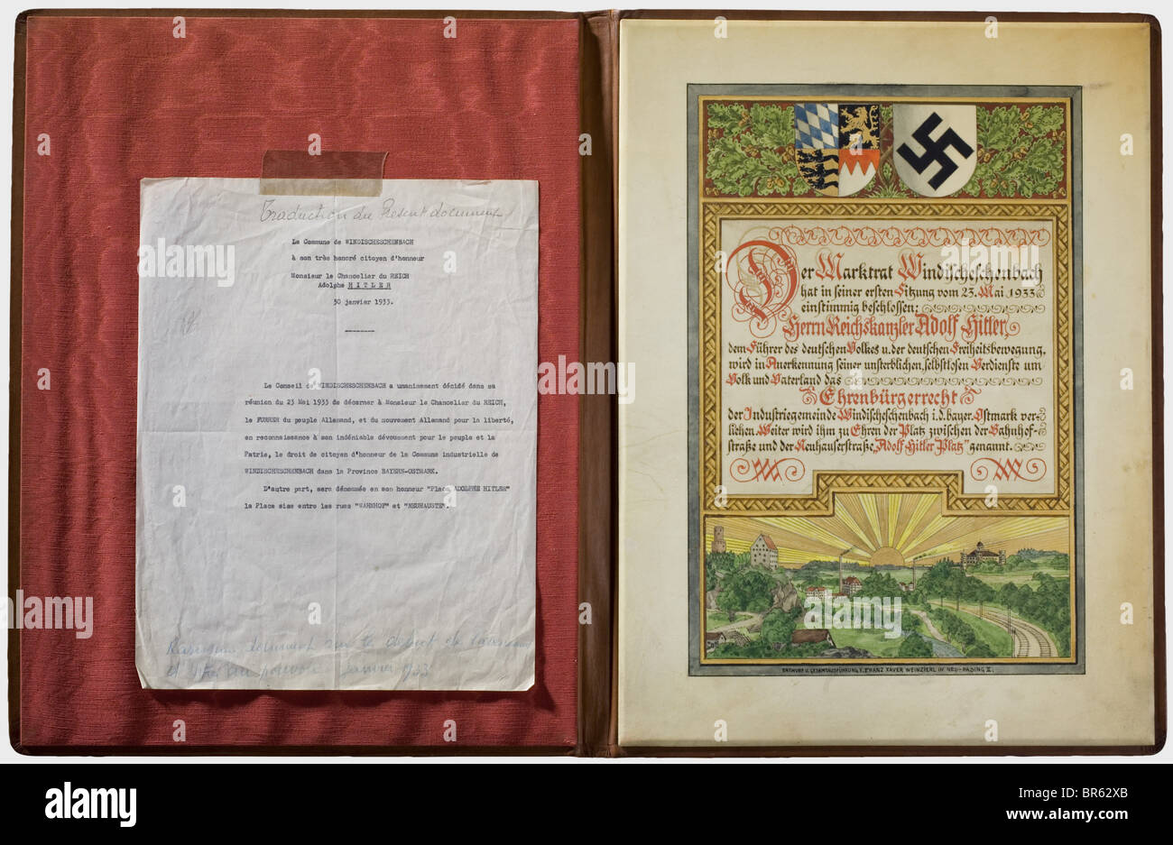Adolf Hitler - a certificate of honorary citizenship, and naming of the main square in 'Adolf Hitler Platz' to honour the Reich Chancellor Adolf Hitler, by the municipality of Windischeschenbach (Bavarian Ostmark), dated 23 May 1933. Designed in fine hand-painting with a depiction of the village, Bavarian coat of arms and swastika. Calligraphic text. In a gold-stamped leather folder with city coat of arms. Dimensions 40 x 30 cm. Today the town is known especially for the Eschenbach porcelain and the continental deep drilling to a depth of nearly 10.000 m. histo, Stock Photo