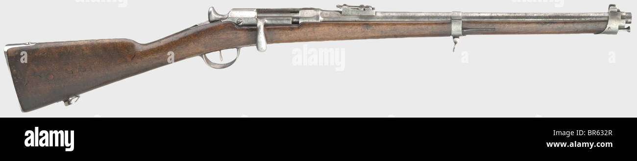 A Chassepot carbine model 71, 11 mm cal., no. 1130. Matching numbers. Mirror-like bore, barrel length 52 cm. Converted chamber with small bore at the end of receiver head for safety reason in case of ruptures. Step sight up to 1300 paces. Original inscription preserved on left side of receiver: 'Manufacture Imperiale Mutzig Mle 1866'. Various Prussian acceptance marks on all main parts. No finish. Spotted barrel, partially fine pitting on bolt-handle and mounts. Full walnut stock with wear marks, massive muzzle ring with guarded sight and integrated discharchin, Stock Photo