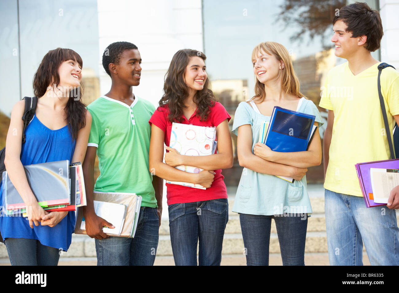 Group Of Teenage Students Standing Outside College Building Stock Photo
