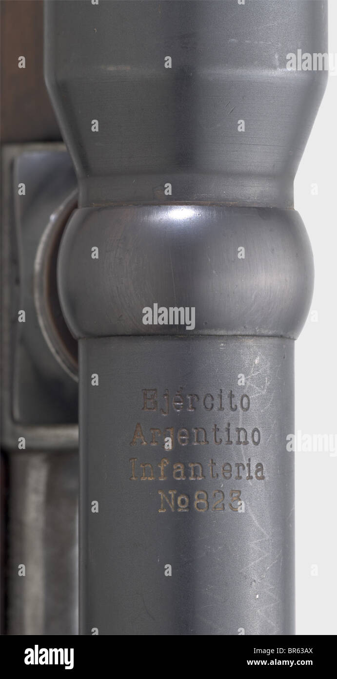 A sniper rifle mod. 1909 with Zeiss scope, 7.65 x 53 cal., no. C9940. Matching numbers. Bent bolt handle. Manufactured at DWM Berlin. Argentine coat of arms on receiver head covered, on the left marked 'Mauser Modelo Argentino 1909'. Complete finish on barrel and fittings. Lock and receiver in the white, slightly spotted. Matching-numbered walnut stock with strap and cleaning rod. Brass muzzle cap. Very good overall condition. Zeiss scope on flat top-hinged mount, on front of body inventory mark 'Ejercito Argentino Infanteria No. 823', on other end marked 'NEDI, Stock Photo