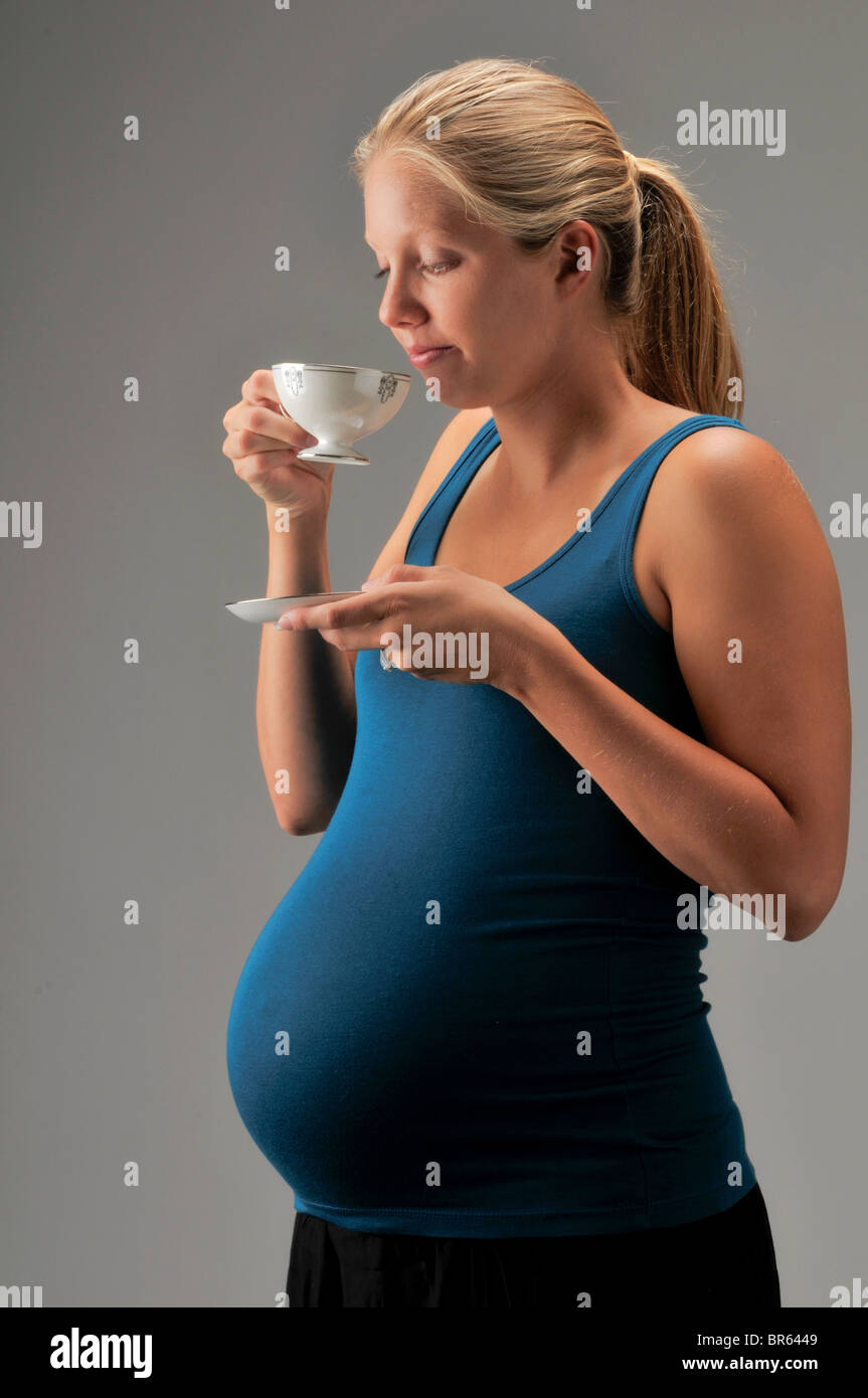 pregnant woman drinking tea Stock Photo Alamy
