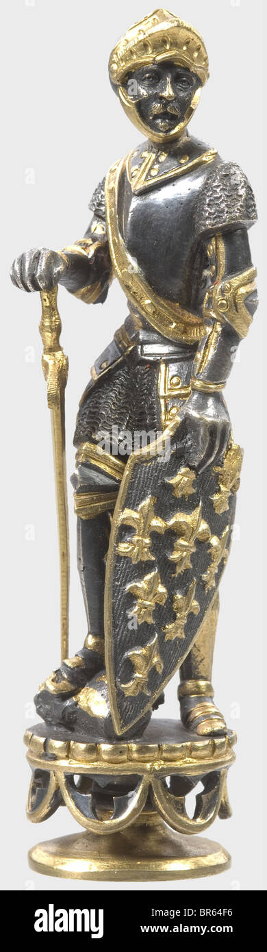 King Ludwig II of Bavaria (1845 - 1886) - a personal seal., Silvered and gilt bronze. The handle in the shape of a historical, knight in full armour, the right hand resting on his golden sword, in the left the shield with fleurs-de-lis. On a neogothic socle. The seal matrix with reverse monogram "L" based on the monogram of the French Sun King Louis XIV, surmounted by the Bavarian Royal crown. Height 10,8 cm. In a velvet and silk lined case with label and handwritten inventory number "306." on the lid, the bottom with remains of another label. Cf. a similar sea, Stock Photo