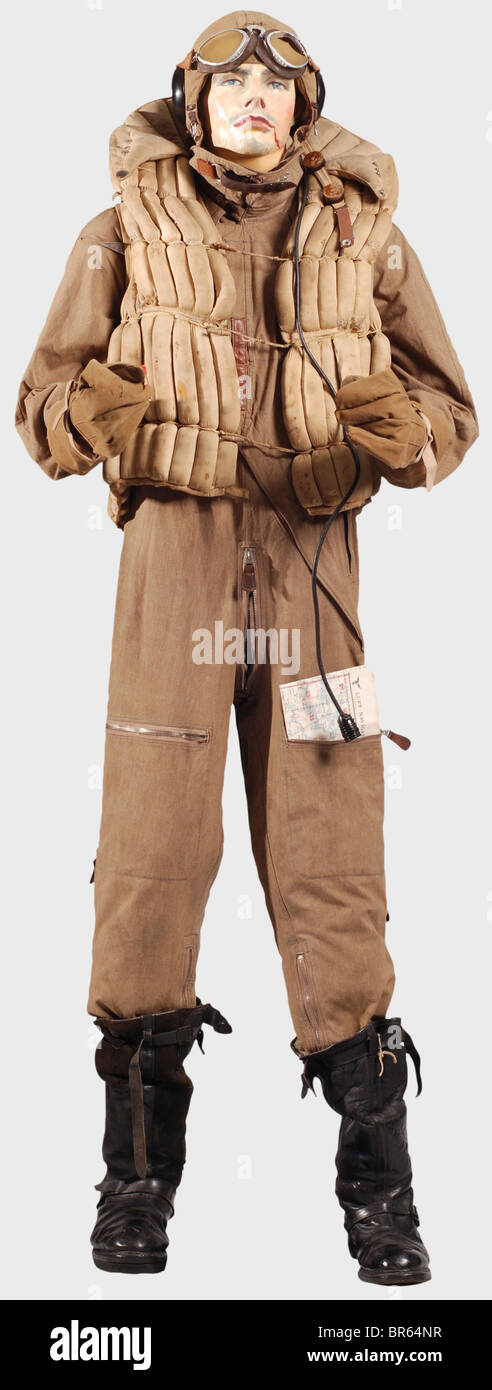 A special summer flying suit for a Luftwaffe bomber crew., An early model LKp W100 flying helmet of sand-coloured linen with brown leather trim, plastic earphone shells, three point attachment for an oxygen mask, separate communications system with twin throat microphones in series, and two connector cables with quick release connectors. Stamped '10. Staffel' (10th Squadron). Protective goggles with adjustable bridge and permanent 'soft' lenses (damaged). A sand-coloured linen flying suit with diagonal zippers, Prym snaps, and Rheinnadel zippers (one defective), Stock Photo