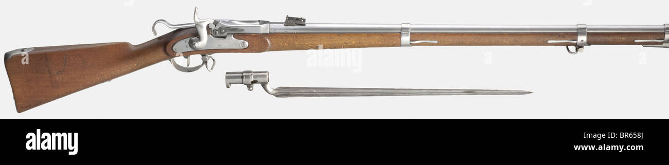 An infantry rifle mod. 1870, Roberts system rolling-block action with bayonet, originally made from an Austrian percussion rifle M 1854 Lorenz. 13.9 mm cal. , no. 35842. Mirror-like, four-groove rifled bore, barrel length 86 cm. Spring sight scaled 4 - 9 paces (675 m) from M 1854/II rifle. Lock plate still with original designation '861' for the year 1861. Serbian arms on left-hand barrel root, on top stamped crown/'J'. Lock marked 'IIM', fittings stamped '88'. All metal parts except sight without finish. Matching-numbered beech wood stock with few wear marks, , Stock Photo