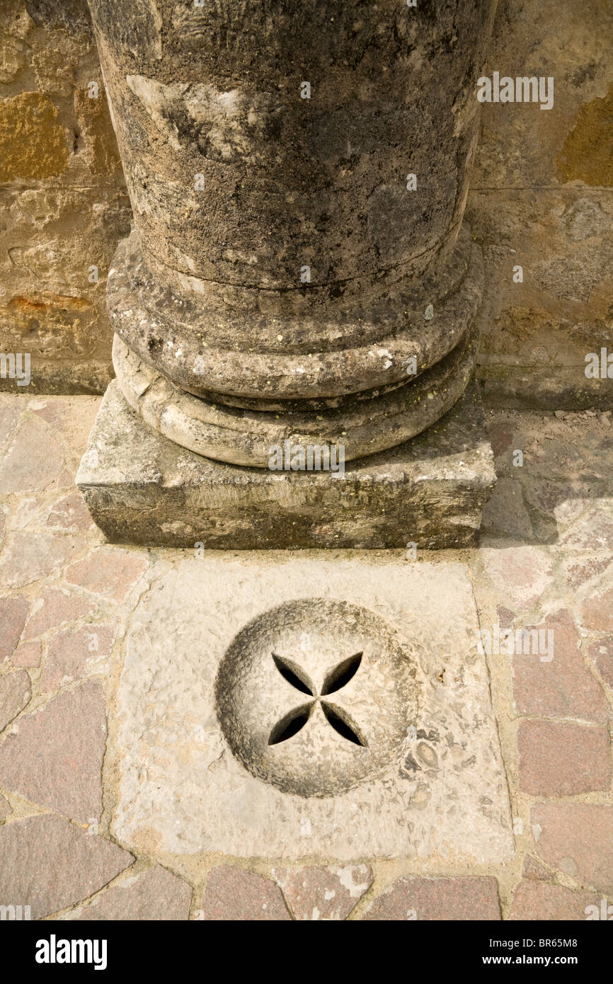Ancient stone water / rain drain the amphitheatre at the ruined Roman city of Italica / Itálica near Seville, Spain. Stock Photo