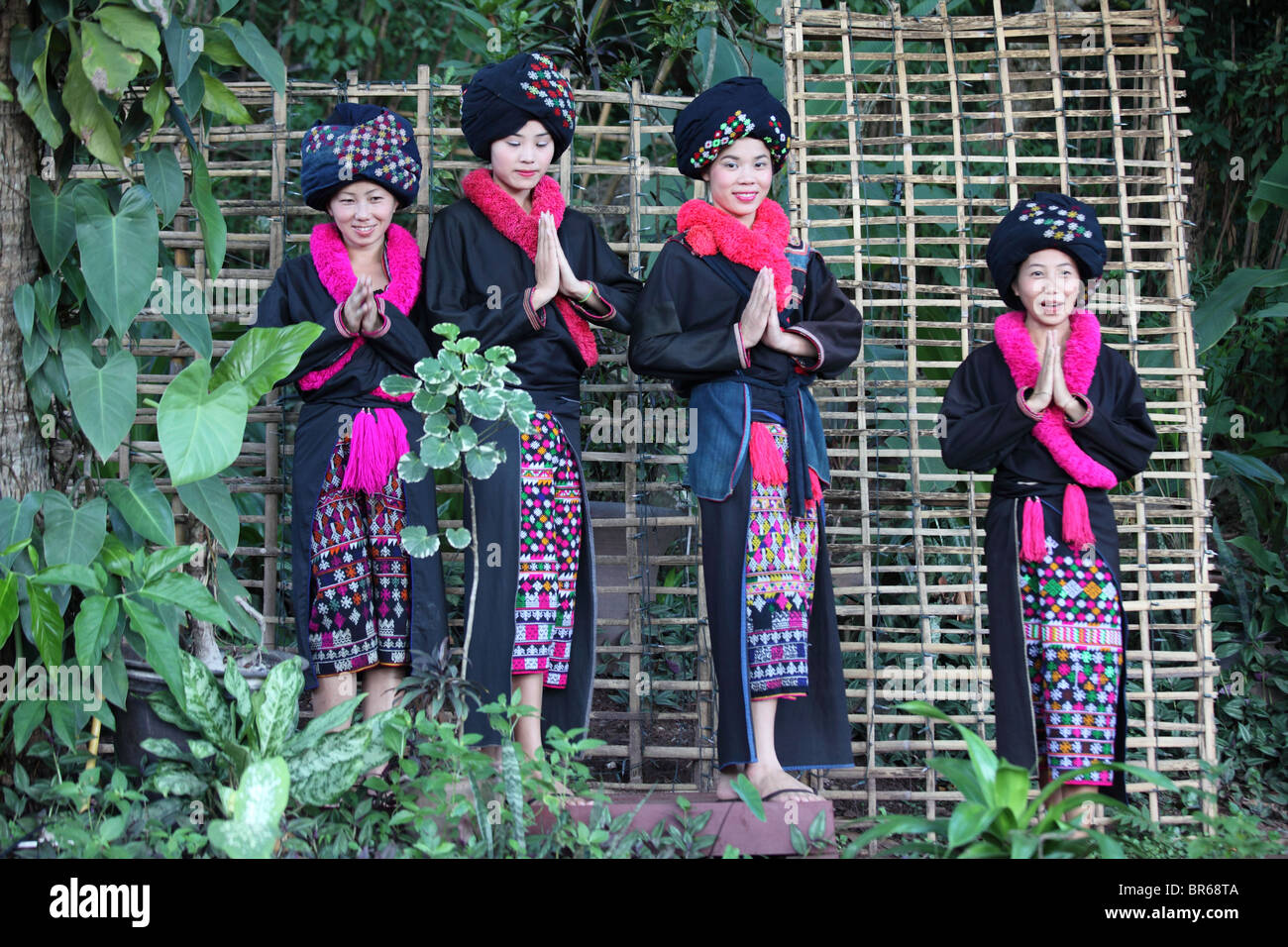 Young People showing of traditional dress of the Yao people in a