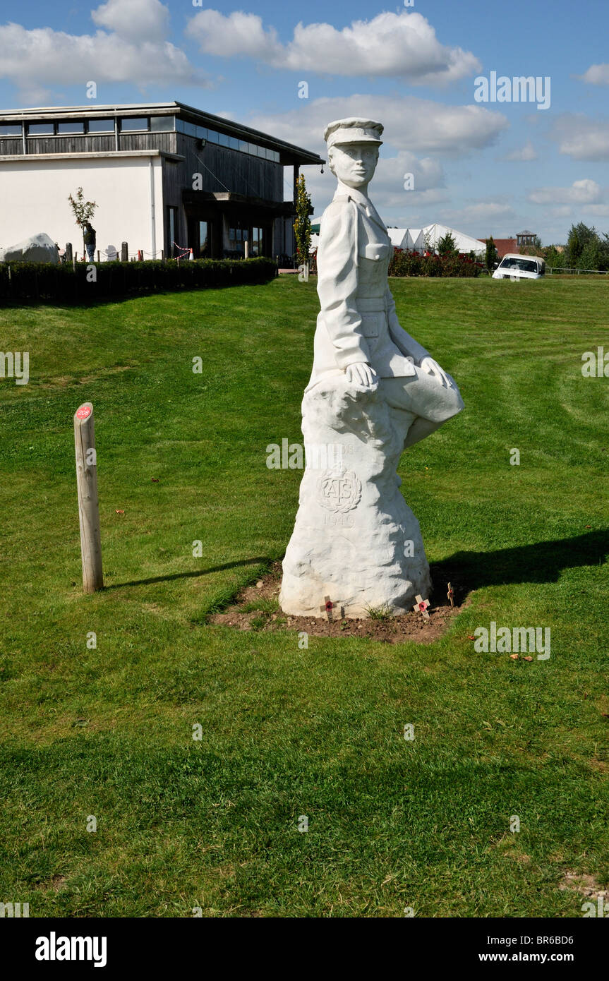 A white statue of an ATS Girl commemorating the Auxiliary Territorial