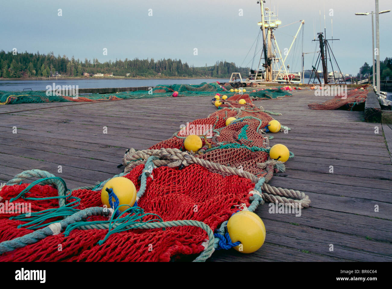 Fishing nets stretched out to dry hi-res stock photography and