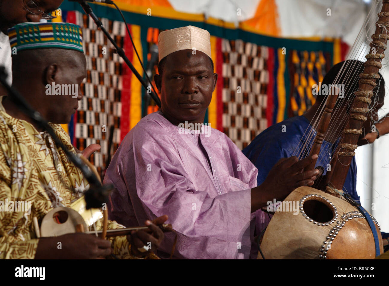 A Malian kora player performs at the 2003 Smithsonian Folklife Festival June 28, 2003 in Washington, DC. Stock Photo