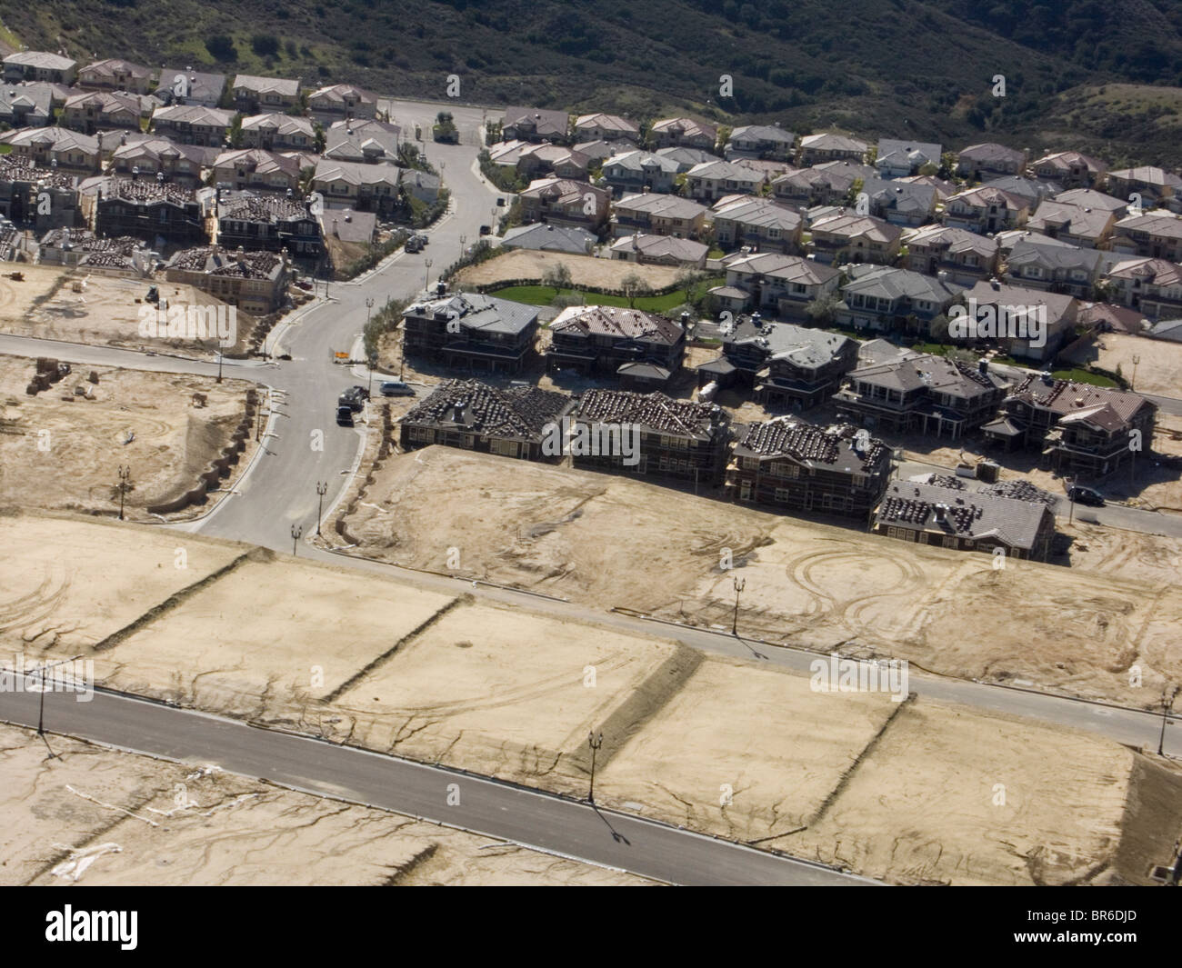 Suburban sprawl as new houses are built up a hillside in Northridge California. Stock Photo