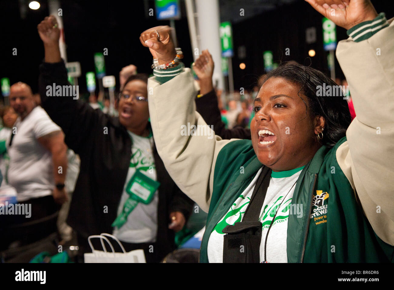 Boston, Massachusetts - A member of the public employees union AFSCME cheers during her union's convention. Stock Photo