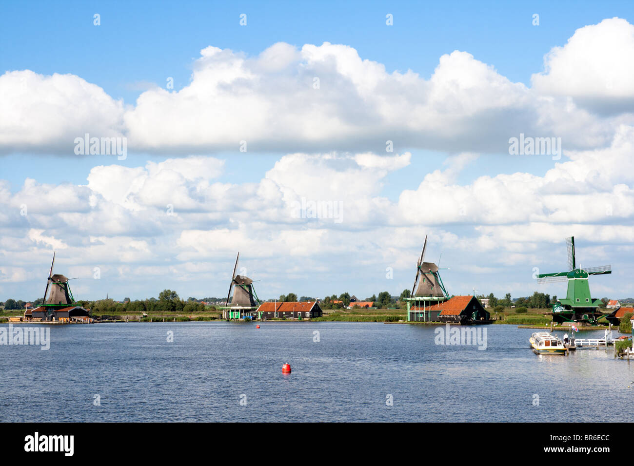 Well-preserved historic windmills and houses at the Zaanse Schans in Holland Stock Photo