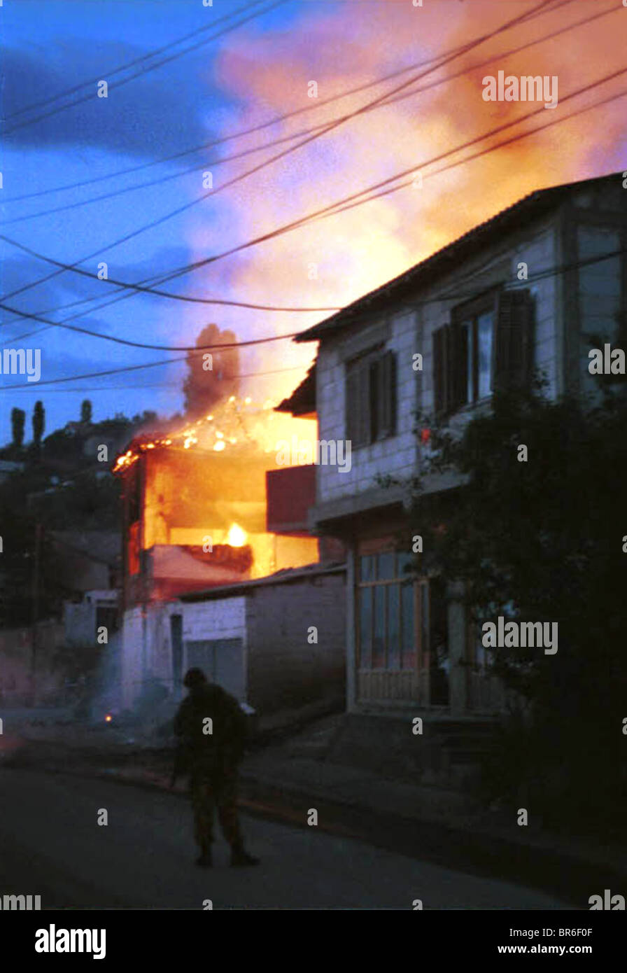 British paratroopers investigate fires and break ins on the Serb Community in Pristina, Kosovo. Stock Photo