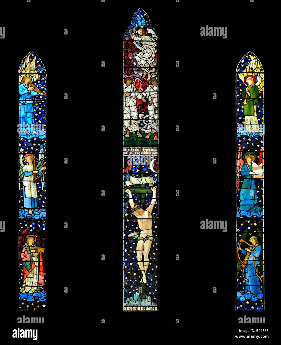 Stained glass panels of the east window, St James Church, Staveley, Cumbria. Designed and manufactured by William Morris. Stock Photo