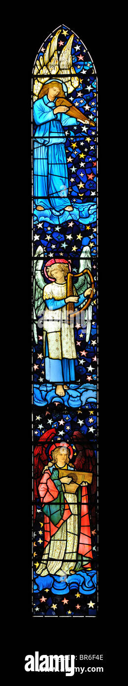 The left panel of the east window of St James Church, Staveley, Cumbria. Designed and manufactured by William Morris. Stock Photo