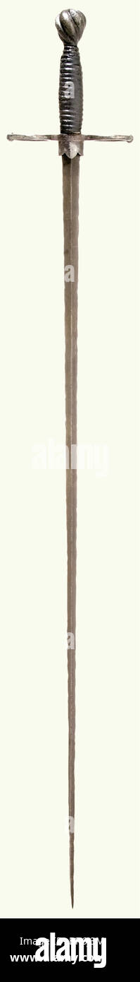 A German estoc, 1st quarter of the 16th century. A straight, lightly hollow ground, quadrangular blade. Iron quillons formed of two rings with a spirally chiselled spherical bulge and a copper-soldered scabbard sleeve. Pear-shaped iron pommel chiselled in a deep spiral. The wooden grip has a well-made replacement leather grip cover over cord wrapping. Signs of heavy corrosion in places. Length 117 cm. Cf. Landes-Zeughaus Graz for four very similar estocs, as well as Sotheby's 21 May 1974, 'Counts von Giech' Part 1, No. 58. historic, historical, 16th century, sw, Stock Photo