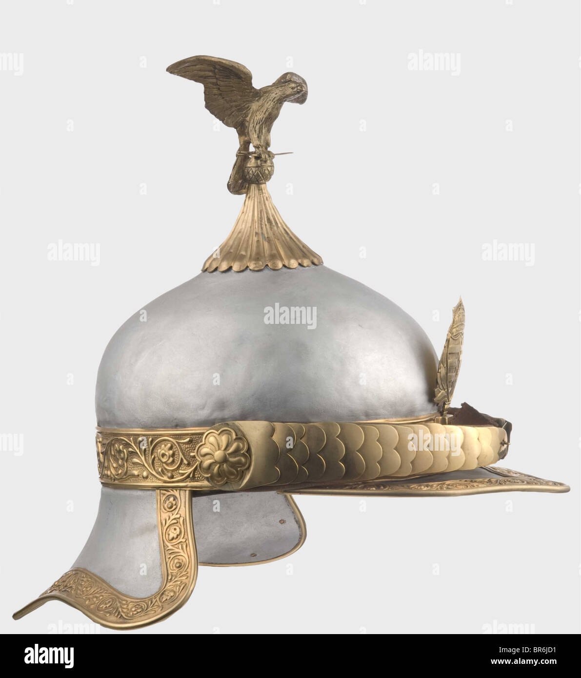 A helmet for generals, 1924 - 1931. Drawn aluminium skull, the surface smoothed and coated with silverbronze. Embossed and gilt brass bands along the perimeter, gilt chinscales, coat of arms emblem and fluted crown piece. The helmet surmounted by a brass eagle carrying a sabre in its talons (original?). Black lining of leather and cloth. historic, historical, 1920s, 1930s, 20th century, 20th century, helmet, helmets, headgear, headgears, protection, protective, uniform, uniforms, utensil, piece of equipment, utensils, outfit, outfits, headpiece, headpieces, obj, Stock Photo