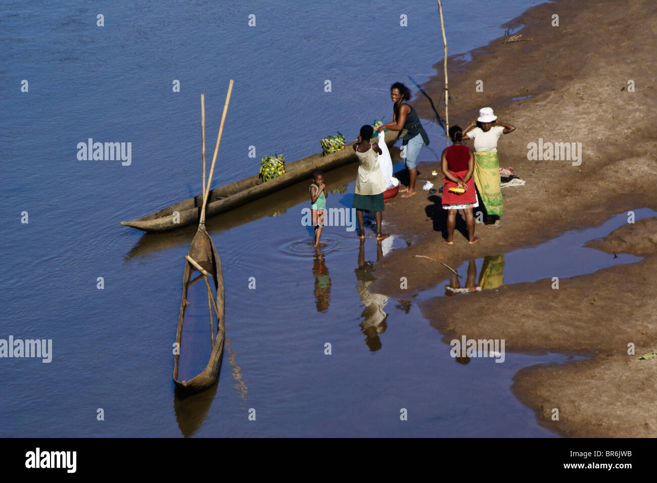 Malagasy people at river, Madagascar Stock Photo