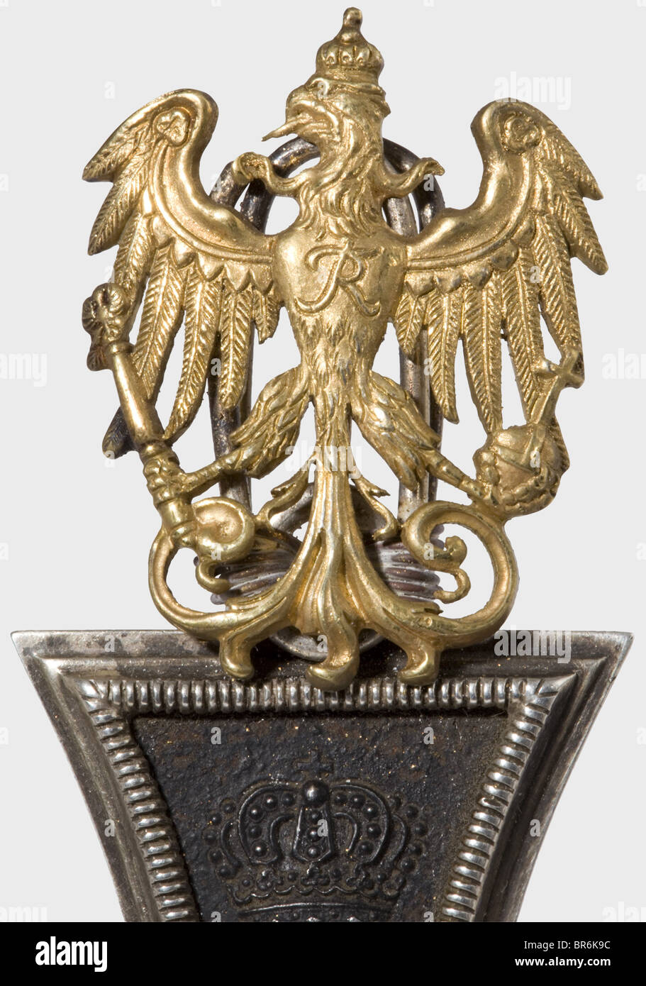 Reich President Paul von Hindenburg (1847 - 1934) - Grand Cross of the Iron Cross 1914, exemplar from the order cushion at his funeral in the Tannenberg memorial 1934. The blackened iron core is somewhat corroded, with silver frame, dimensions 62 x 62 mm. Attached to the eyelet and the suspension ring a gilt eagle appliqué of the field marshal's baton. The Grand Cross is mounted in a later frame of silver laurel branches with superimposed, gilt silver coat of arms of the von Beneckendorff and von Hindenburg family, on a small marble base. With it a letter of Pa, Stock Photo