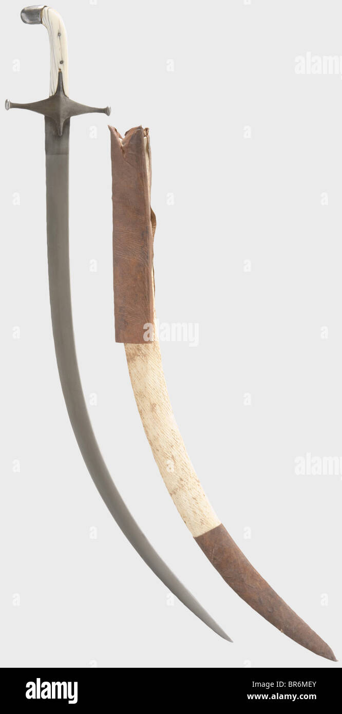 A Persian shamshir, 19th century. Curved single-edged blade and quillons of wootz-Damascus. Grip scales of bone, iron grip strap. Comes with some scabbard fragments. Length 85 cm. historic, historical, 19th century, Persian Empire, object, objects, stills, clipping, clippings, cut out, cut-out, cut-outs, thrusting, thrustings, blade, blades, melee weapon, melee weapons, hand weapon, hand weapons, handheld, weapon, arms, weapons, arms, Stock Photo