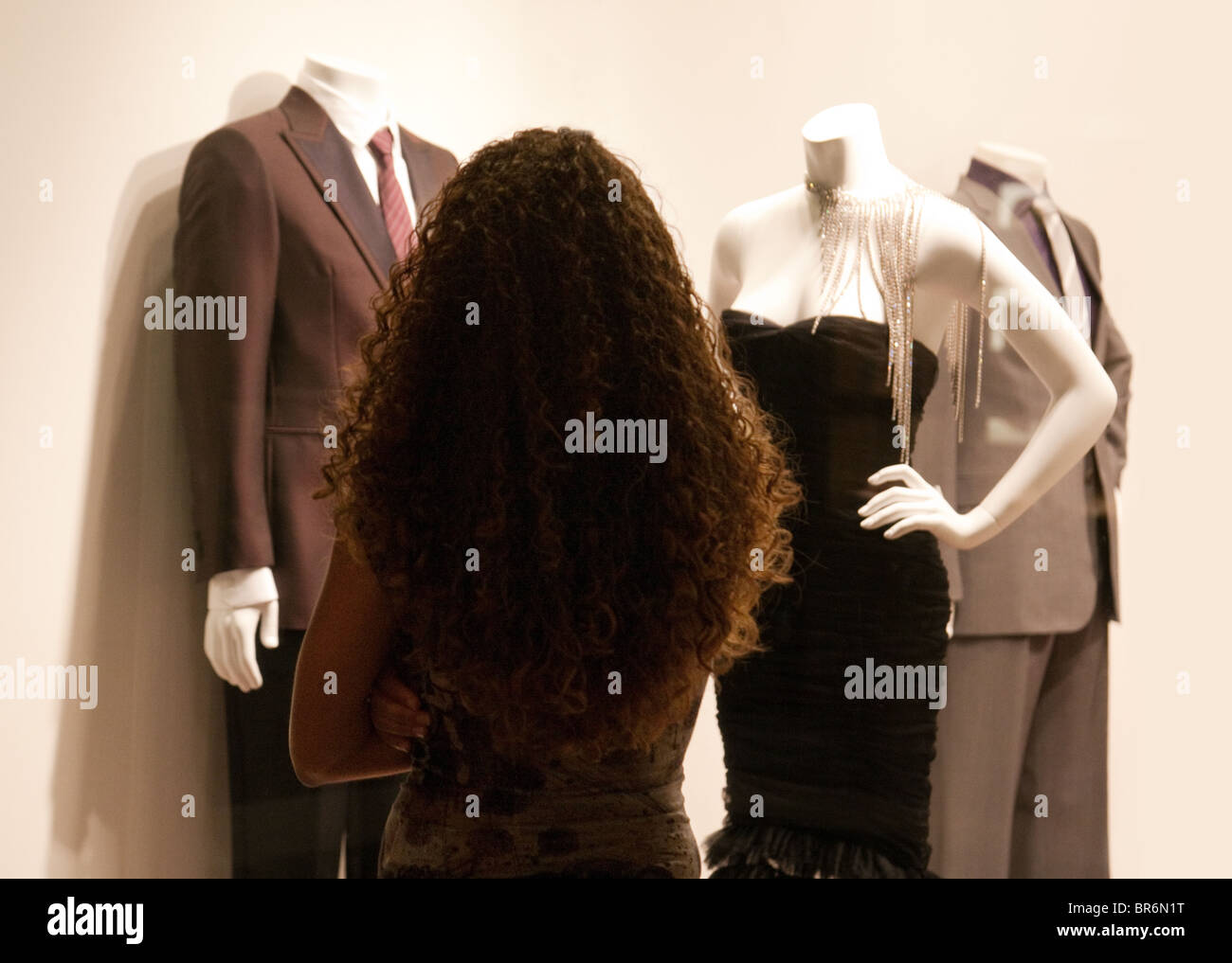 Rear view of a woman looking at a clothes shop window, Las Vegas USA Stock Photo