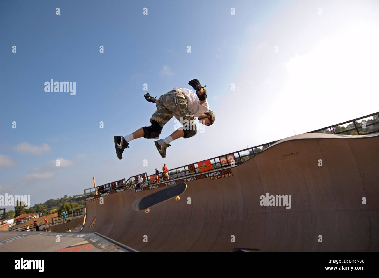 Pro skater Bob Burnquist practicing a trick on his skateboard shortly