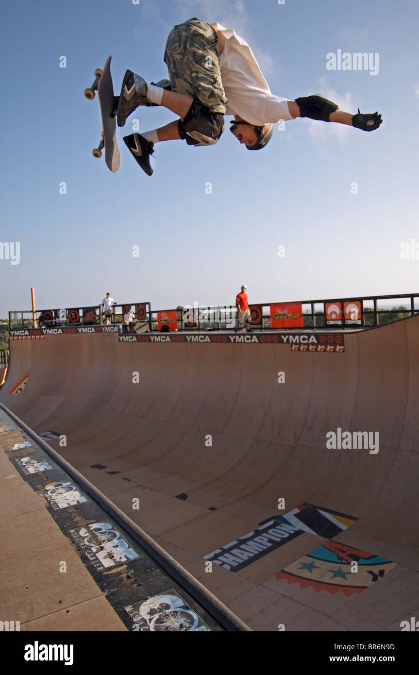 Pro skater Bob Burnquist practicing a trick on his skateboard shortly