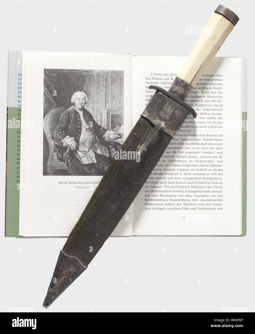 A hunting dagger., Single-edged blade with a double-edged point. Simple iron quillons, conical bone-grip, silver ferrule and pommel-cap. Length 36 cm. Leather scabbard with silver mounts. On the obverse side an engraved coat of arms and the inscription 'Jägermeister David von Splitgerber 1857', the reverse showing a coat of arms and 'Garde Jäger-Hauptmann Eric von Witzleben 1857'. David von Splitgerber (1683 - 1764) was an entrepreneur in Berlin, canon of Caminn and master hunter to Prince Ferdinand of Prussia. Eric of Witzleben (1847 - 1919) was a Prussian maj, Stock Photo