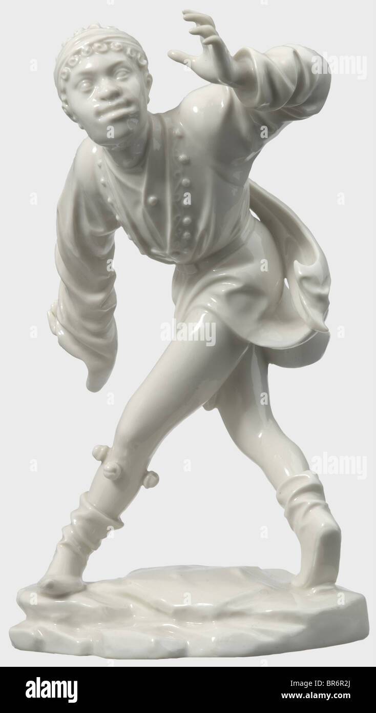 The Moor in original box., White, glazed porcelain from the Morris Dancer series. Manufacturer's pressmark 'SS Allach' on the bottom. Restored hands. Height 22 cm. The original box imprinted on the lid 'München Hauptstadt der Bewegung' with the city's coat of arms, beneath it a retouched flaw, interior incomplete. Custom version without model number for the City of Munich, after the famous late Gothic wood figures by Erasmus Grasser exhibited in the Munich City Museum. Figure I, 'The Moor' appeared in 1939. historic, historical, people, 1930s, 20th century, obj, Stock Photo