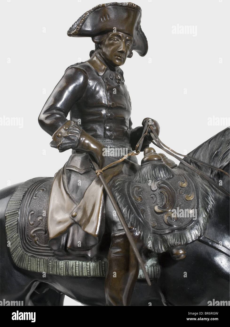 Rudolf Kaesbach (1873 - 1955) - Frederick the Great, a bronze statue of the king on horseback, with black patina. Signed on the plinth 'R. Kaesbach'. On a black/green marble base, total height 54 cm. The point of the sword is missing. Rudolf Kaesbach studied in Hanau, Paris and Brussels and is known as a established sculptor (Thieme-Becker, vol. XIX, p. 424). Portrayal of Frederick the Great in classical quality. historic, historical, people, 19th century, Prussian, Prussia, German, Germany, object, objects, stills, clipping, clippings, cut out, cut-out, cut-ou, Stock Photo