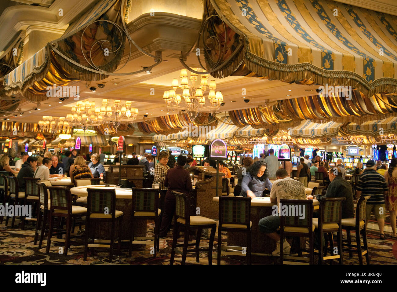 People playing Blackjack inside the Bellagio Hotel and Casino, the Strip, Las Vegas USA Stock Photo