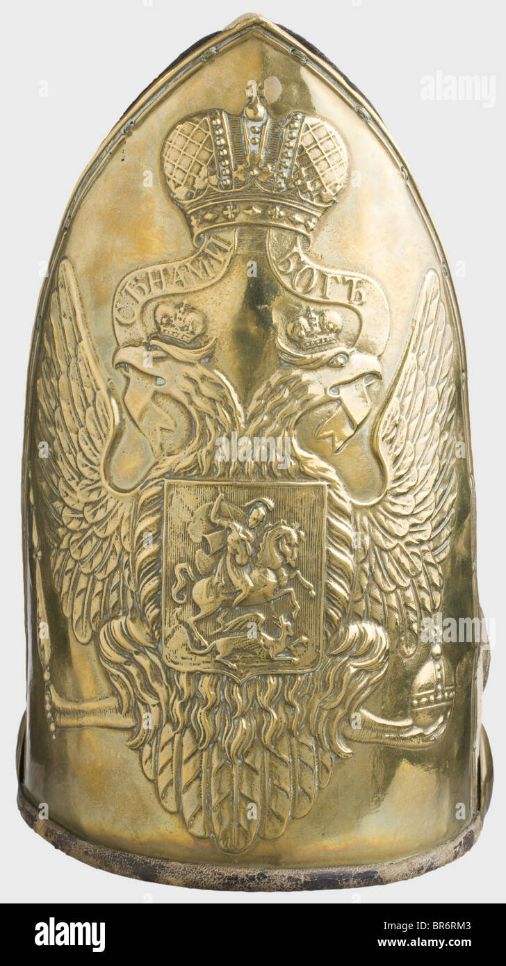 A cap for a grenadier of the Pavlovski Grenadier Regiment, from the reign of Tsar Alexander I. Brass cap plate stamped with the Russian double-headed eagle. Red cap bag on a white body (moth damage) and lace. Three pinned brass grenades. Leather lining. Very rare grenadier cap in original condition. historic, historical, 19th century, uniform, uniforms, clothes, piece of clothing, headpiece, headpieces, cap, caps, hat, hats, bonnet, bonnets, accessory, accessories, object, objects, stills, clipping, clippings, cut out, cut-out, cut-outs, Stock Photo