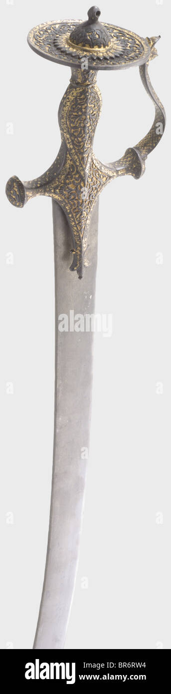 An Indian tulwar with chiselled hilt, 18th century. Strongly curved ...