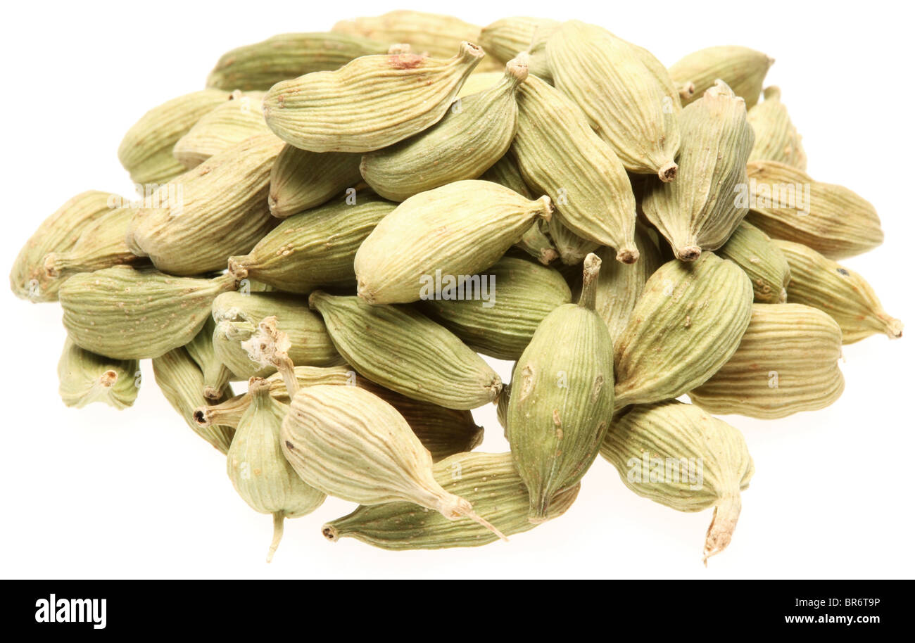 Cardamom seeds on a white background Stock Photo Alamy