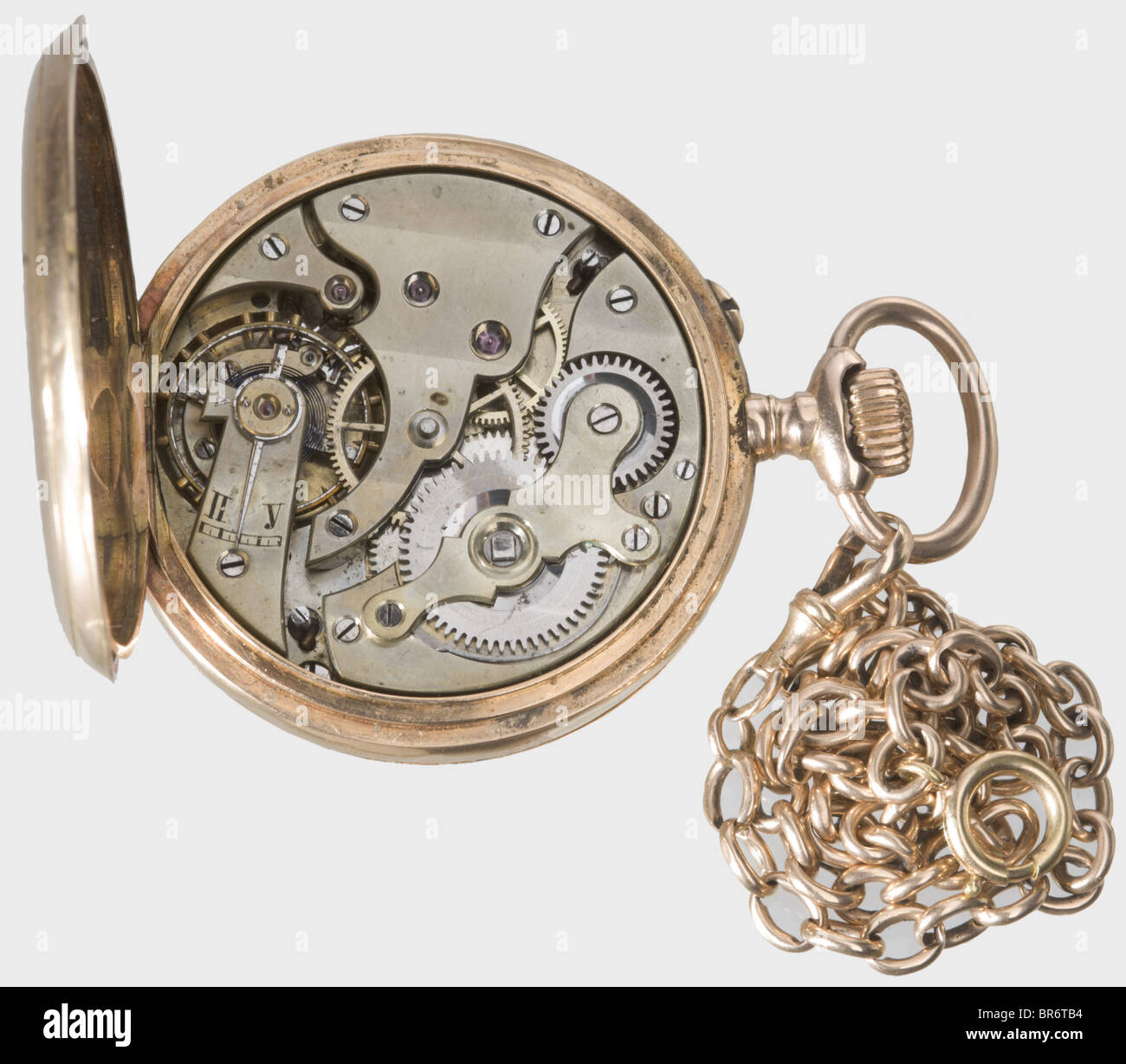 A golden savonette pocket watch with Imperial Russian double-headed eagle, Pavel Bure, Court Watch Maker to the Imperial House. The lid bears the Tsarist double eagle partially enamelled in blue and black. White enamel dial (fissures) with gold hands, black Roman and Arabic numerals, as well as small second. Working, jewelled precision movement. Engraved on the back with serial number '203521', and mark of fineness '0,583'. Golden watch chain. In a damaged red leather case with a gilt eagle on the lid. The maker's mark is stamped in gold on the silk lining. his, Stock Photo