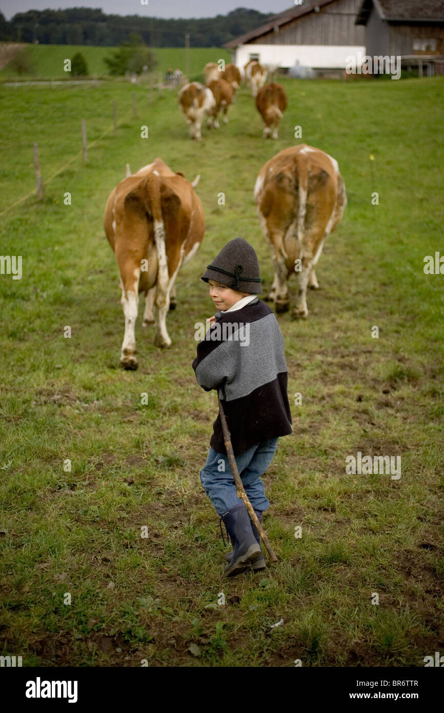 Childe Farming Routine Children on farm chores hi-res stock photography and images - Alamy