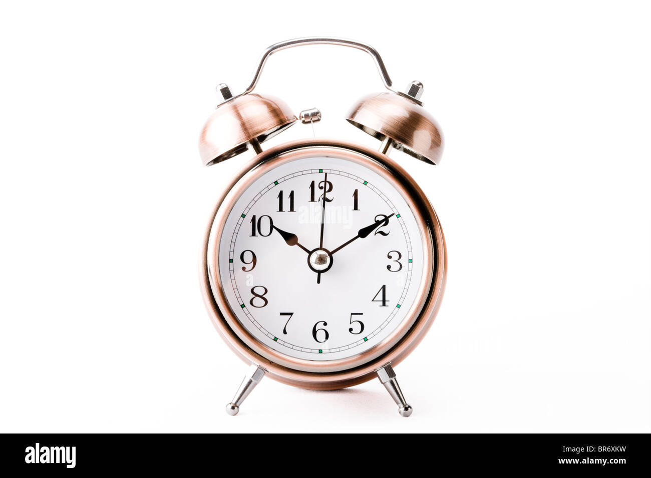 Copper alarm clock with bells on white background Stock Photo Alamy