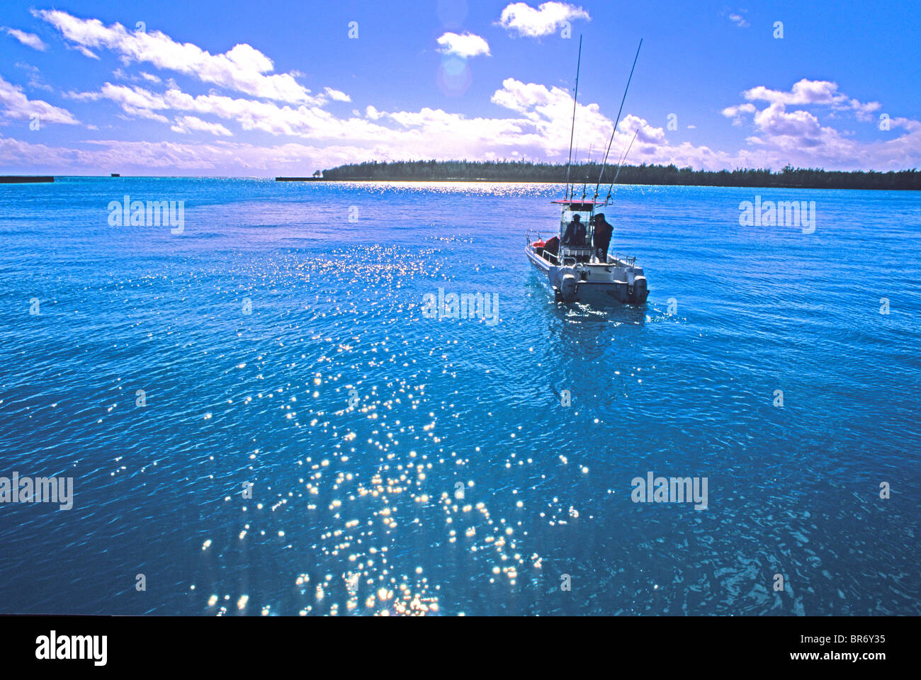 A sport fishing boat in the lagoon on Midway Atoll Hawaii Stock Photo -  Alamy