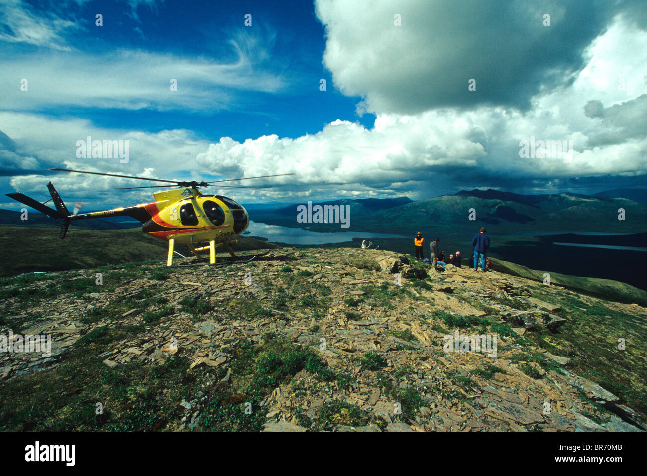 A picnic lunch while heli-hiking from the Inconnu Lodge in Canada's Yukon Territory. Stock Photo