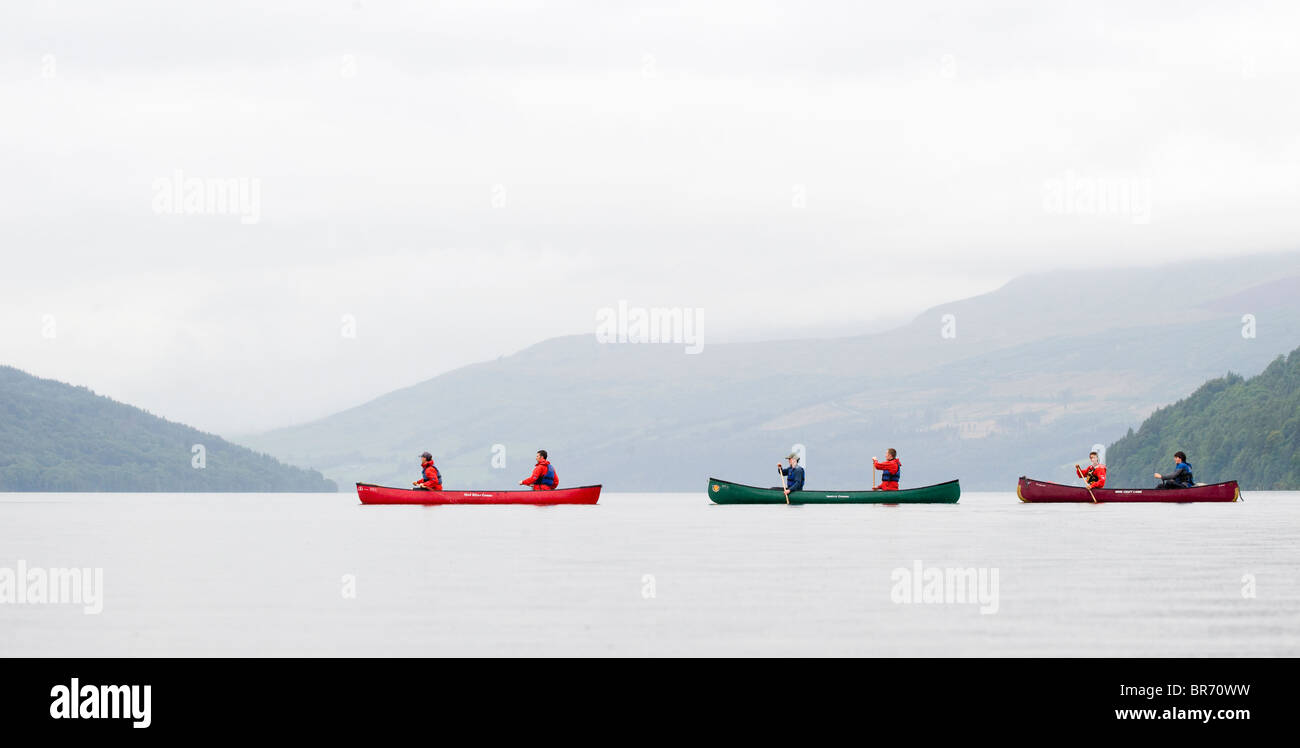 Three canoes on Loch Tay, Kenmore, Perthshire, Scotland Stock Photo Alamy