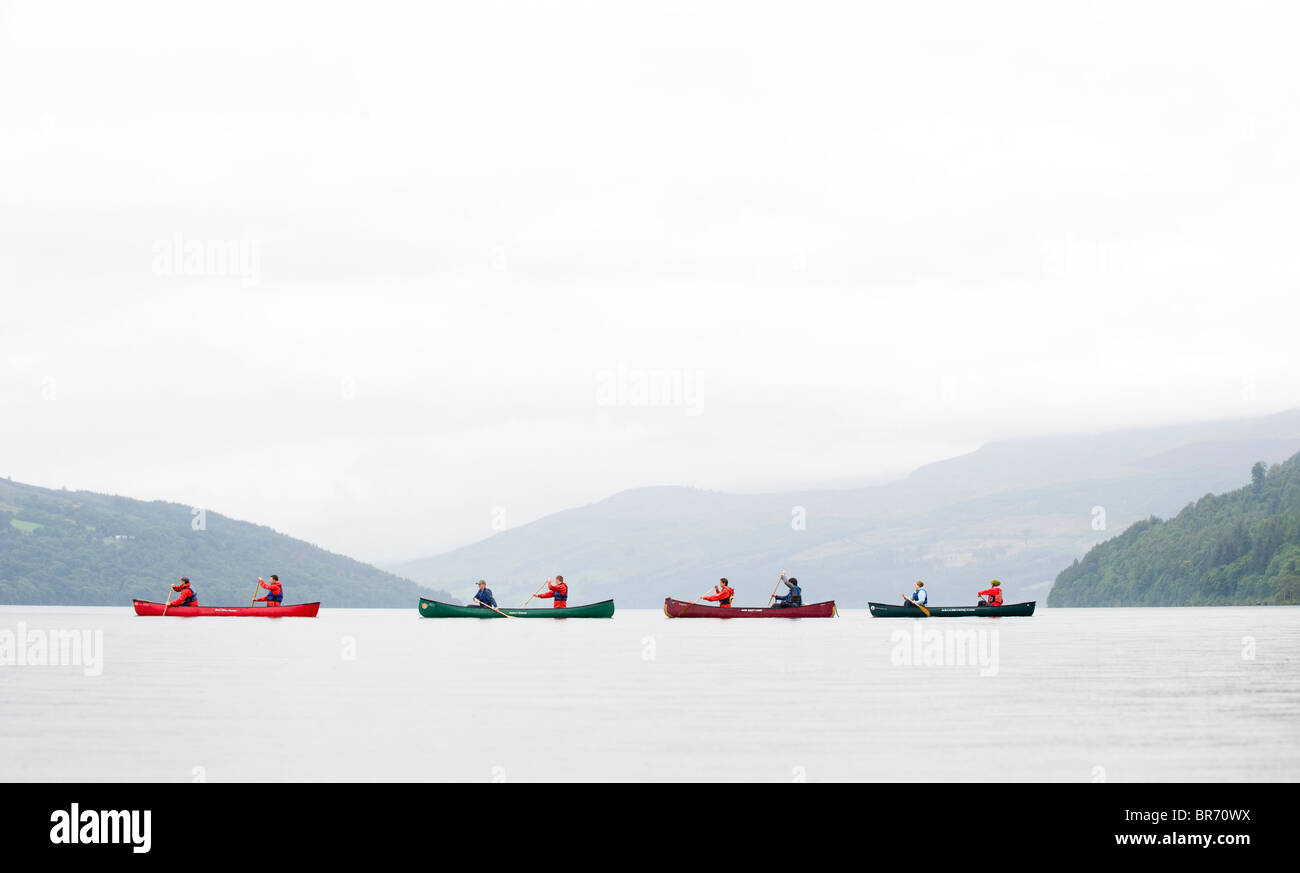 Four canoes on Loch Tay, Kenmore, Perthshire, Scotland Stock Photo Alamy