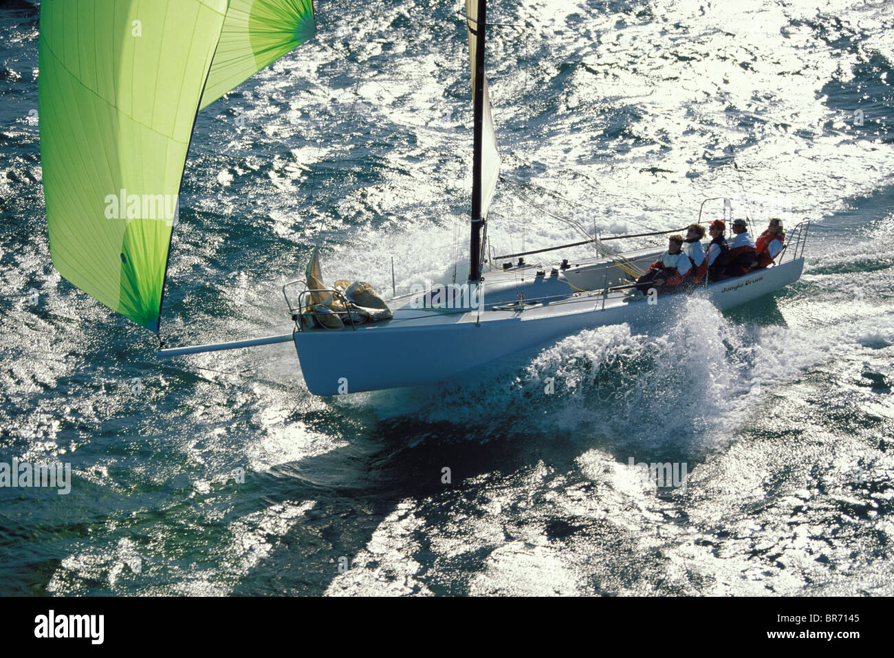 The Crew Of The J90 Jungle Drum Sitting Aft On The Windward Rail As The Boat Takes Off Downwind Under An Asymmetric Spinnaker Stock Photo Alamy The Crew Of The J90 Jungle Drum Sitting Aft On The Windward Rail As The Boat Takes Off Downwind Under An Asymmetric Spinnaker Stock Photo Alamy